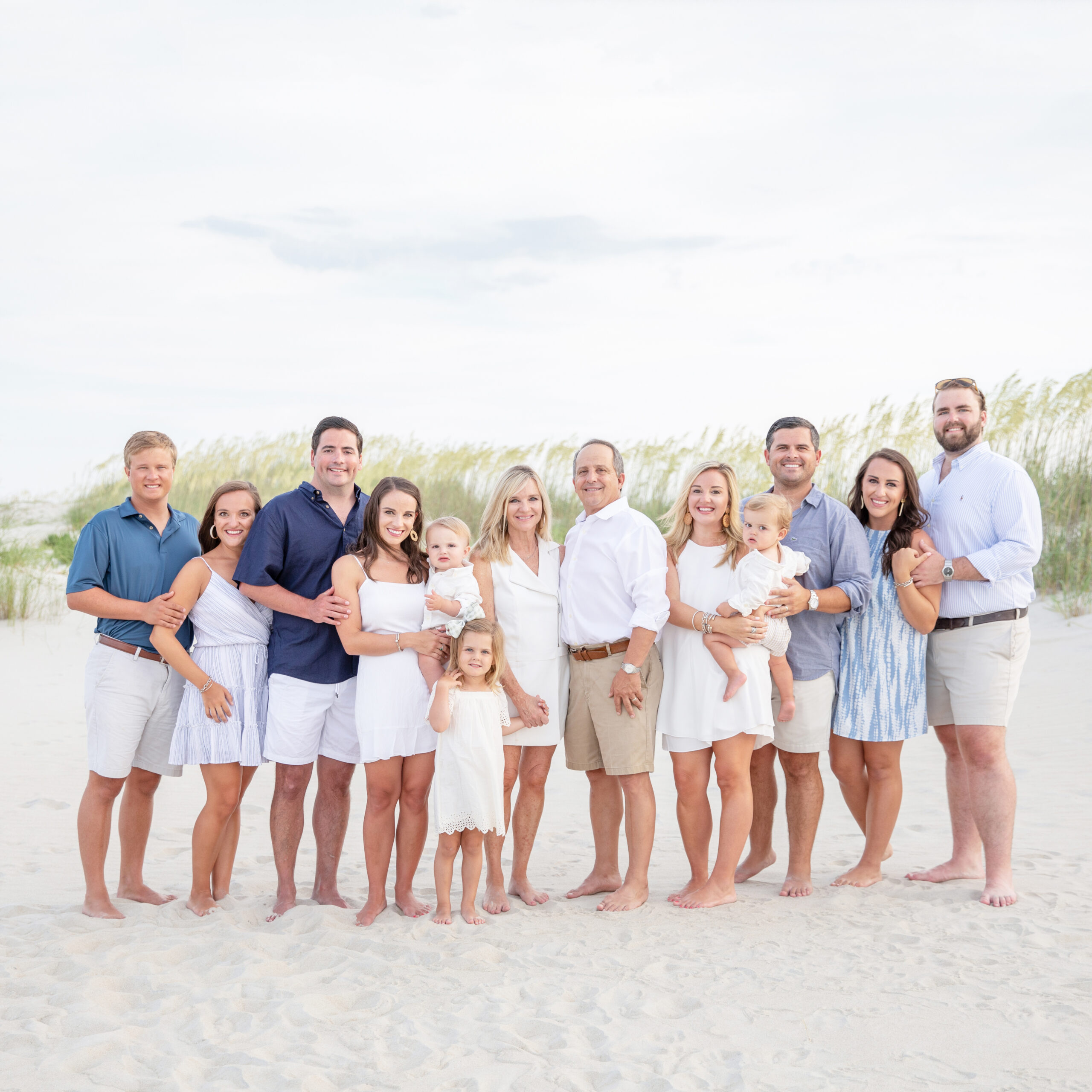 extended family photographed on the beaches of sea island ga