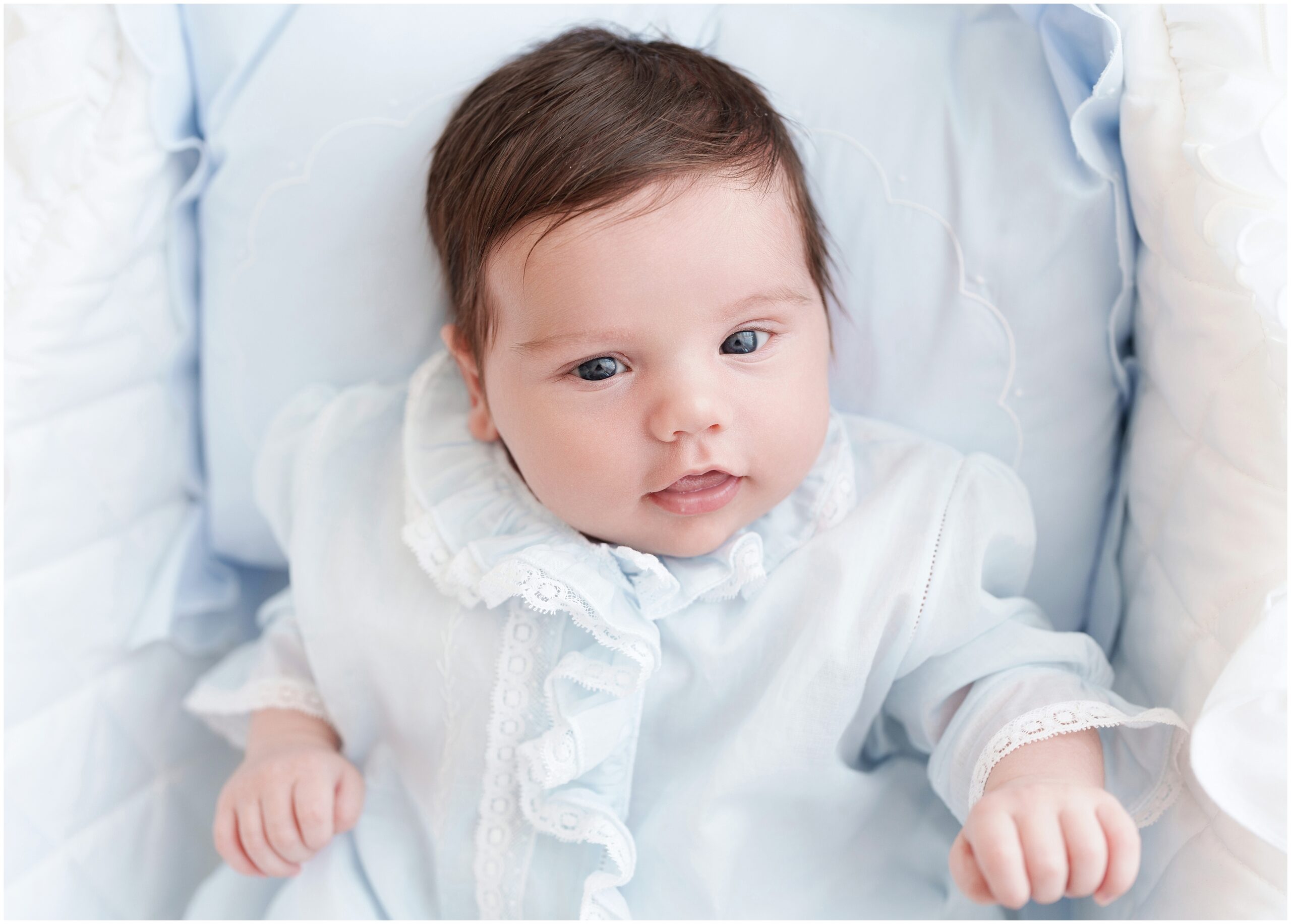 newborn baby boy photographed in his father's newborn grandmillenial style outfit