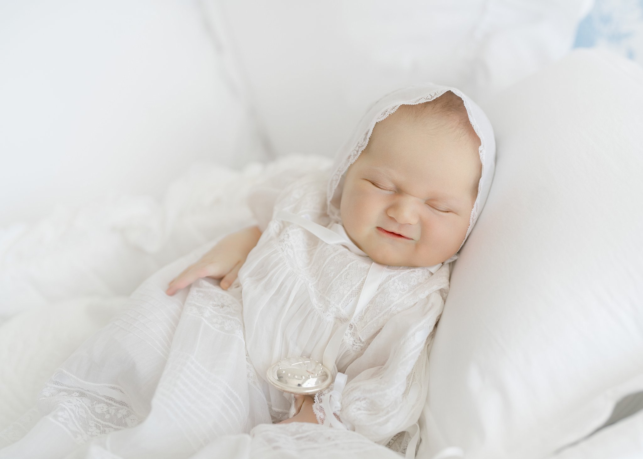 Timeless newborn portrait with simple feltman brothers daygown and soft posing, St. Simons Island newborn photographer