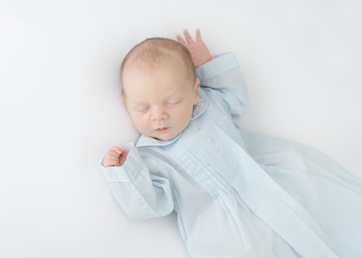 newborn baby boy dressed in feltman brothers daygown in brunswick ga studio