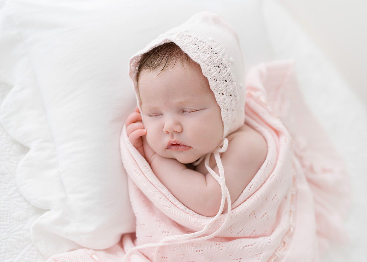 baby girl dressed grandmillenial style in brunswick ga newborn photography studio