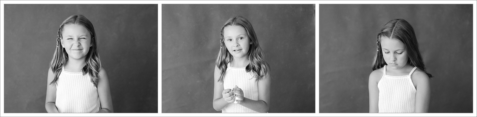 elementry age girl photographed for the childhood edit in brunswick ga in black and white on a black background